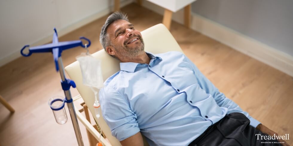 A happy client having an iv drip therapy